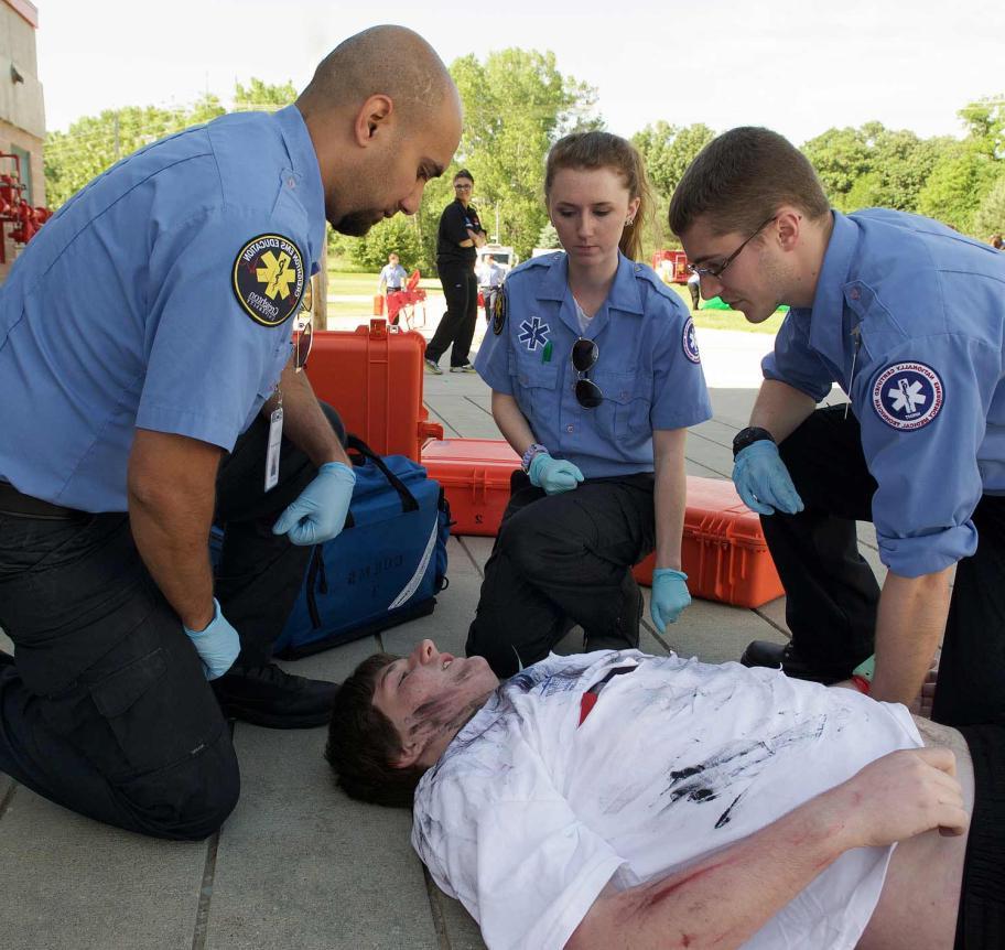 Emergency Medical Services attending to injured person